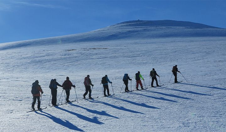 Groupe à ski de randonnée sur les plateaux du Rondane - Norvège